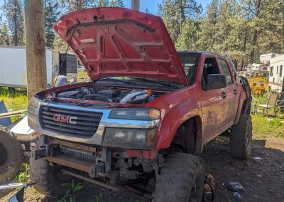 Dead or Alive Auto Recycling Ltd | GMC red truck